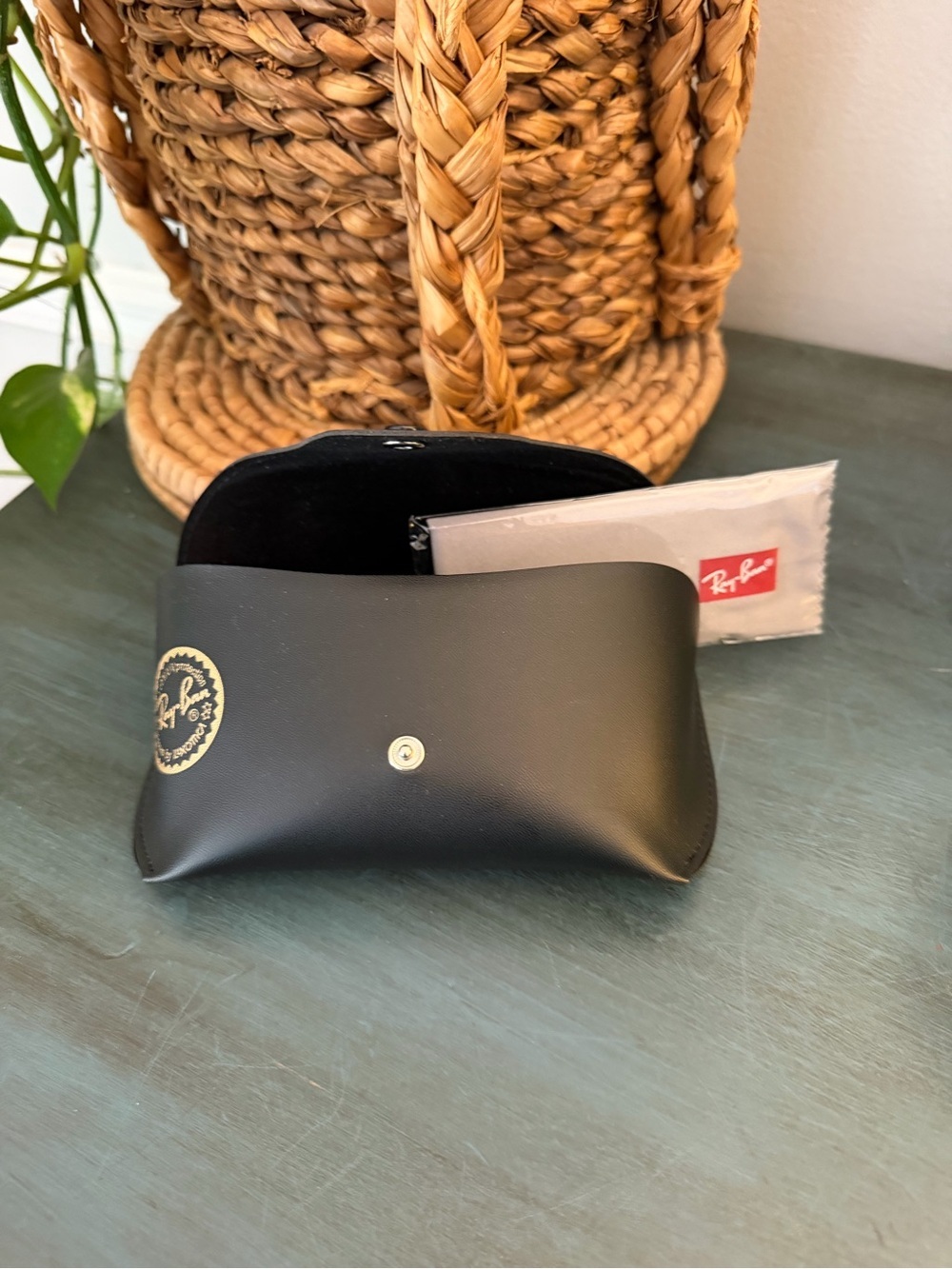 Ray-Ban Sunglasses case with signature gold snap closure. Glass cleaning cloth